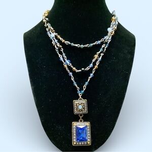 Heidi Daus Dazzling Gold and Blue Pendant With Swarovski Crystals.